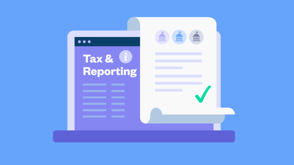 Laptop reading 'tax and reporting' with receipt on top